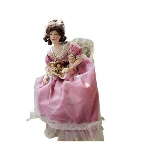 Porcelain Doll and Chair